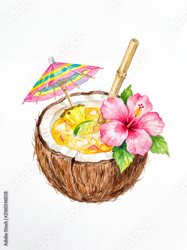 Tropical coconut cocktail with umbrella, lime and hibiscus flower, refreshing summer drink in hollowed coconut