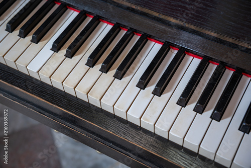 Detail of a section of old piano keys.