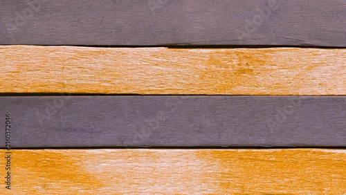 Wooden slat pattern with orange and gray planks for creative designs