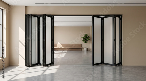 Modern folding glass doors opening into a minimalist spacious room featuring neutral beige walls and polished grey concrete floor surfaces