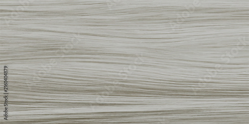 Close-up of natural white cotton thread resting on a textured brown wooden surface with rich grain detail