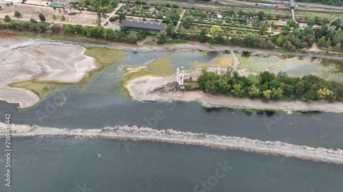 Confluence of Nahe and Rhine River at Bingen, Germany - Visible rocks and sandbars due to extraordinary low water level after a long period of drought - aerial view