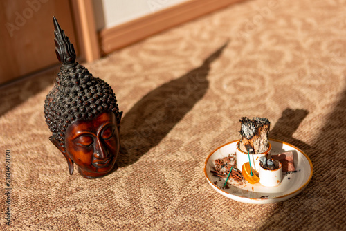 Buddha statue and incense ritual for peaceful home meditation