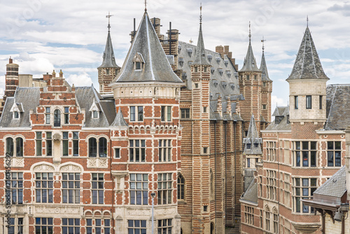 Antwerp town in Belgium, Europe. Historic European Architecture Featuring Gabled Roofs and Elaborate Stone and Brick Facades Under a Cloudy Sky