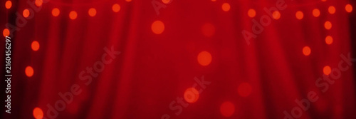 Abstract red background with blurred lights and soft fabric texture, festive holiday backdrop for christmas or valentines day celebration, copy space for text