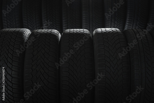 Fotografie Tire at repairing service garage background