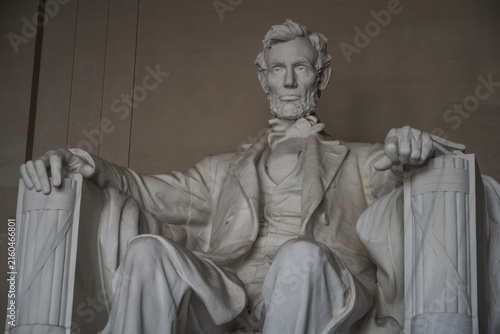 View of the Lincoln Memorial statue of Abraham Lincoln, a large marble sculpture of the seated president in Washington, District of Columbia, United States.