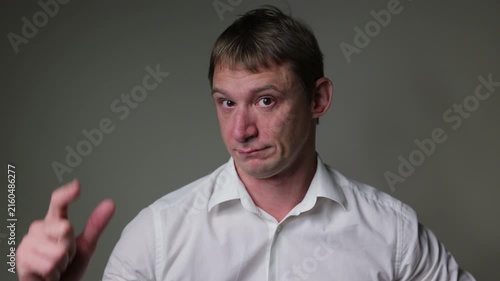 Businessman in a suit looking at the camera. Studio portrait isolated on a white background, suitable for business, stress andal concepts.	Businessman got idea

