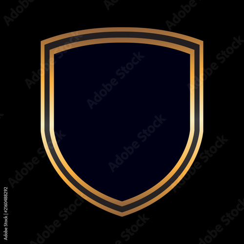 Elegant metallic gold shield badge emblem with dark center and glowing outline isolated on black background metallic protection