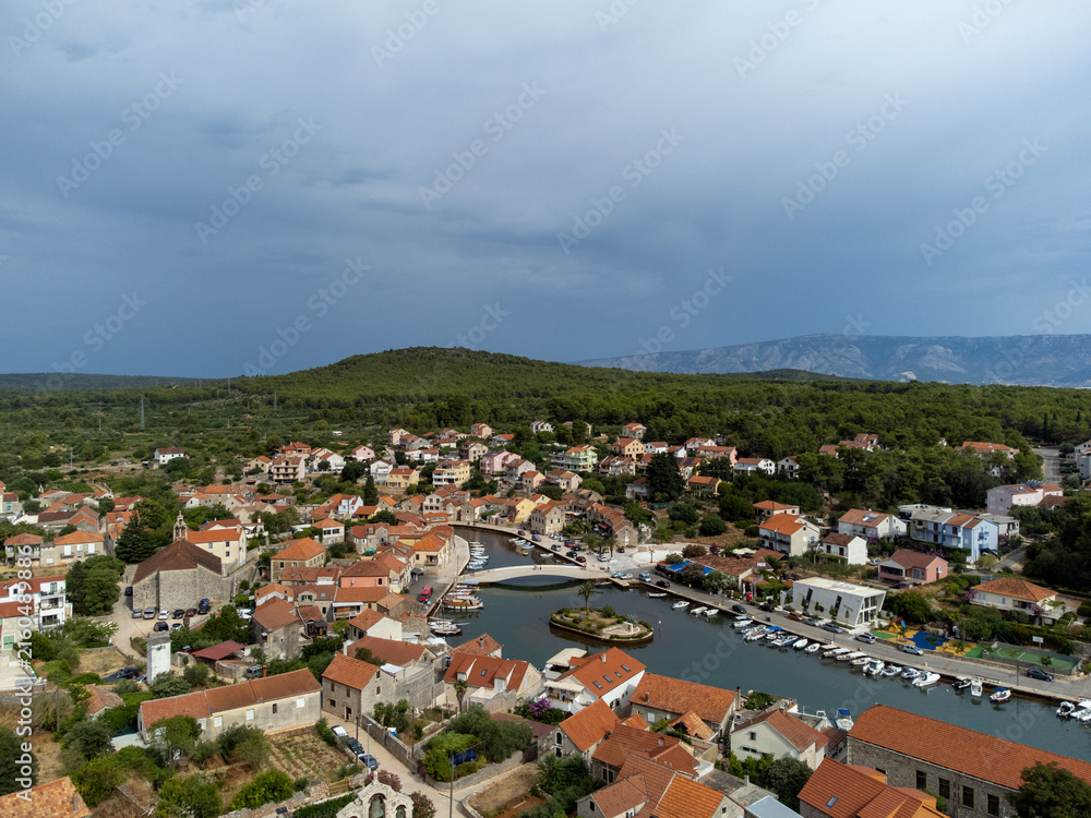 Fototapeta premium View on traditional architecture in town Vrboska on island Hvar in Dalmatia, Croatia