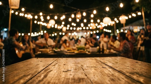 Cozy night gathering with festive lights and lively conversations at a wooden table