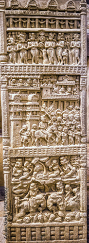 Buddhist narrative relief depicting a royal procession entering a fortified city, with horse-drawn chariots, palace balconies, spectators, and attendants, from the Great Stupa Torana at Sanchi, Sanchi
