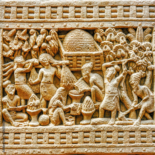 Early Buddhist aniconic sculpture depicting ritual veneration of a sacred stupa surrounded by worshippers and auspicious vegetation, Sanchi Stupa Complex, India