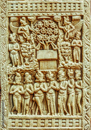 Aniconic Buddhist relief depicting the veneration of the sacred Bodhi Tree by devotees, celestial beings, guardian figures, symbolizing the Enlightenment of the Buddha, from the Great Stupa, Sanchi