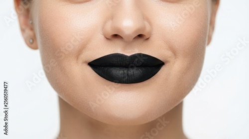 Close-up of Woman with Bold Black Lipstick on Lips