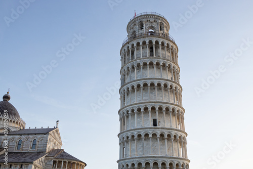Картината върху платно Leaning Tower of Pisa with intricate architectural details against a clear blue