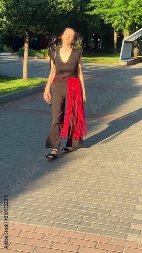 Woman wearing a stylish handmade red macrame belt