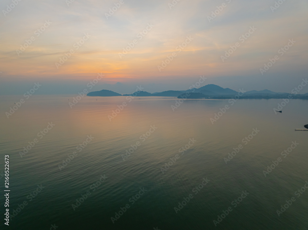 Fototapeta premium Amazing light of nature beautiful Light Sunset or sunrise over sea sky background