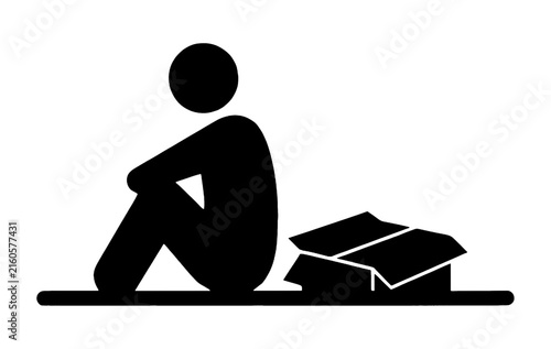 Картината върху платно Silhouette of a lonely person sitting beside an empty cardboard box