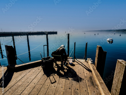 Fotografie Magnificent Sunny Day Pier Fisherman