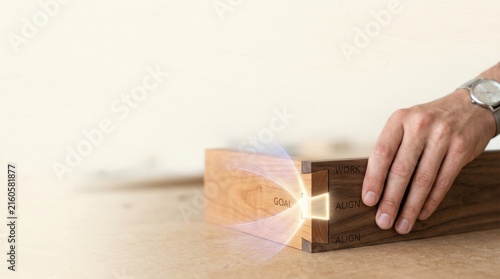 Person cutting wood to visualize strategic alignment strengthening business priorities with genuine fit