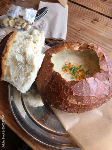 Foto Clam Chowder in Bread Bowl. Homemade cream soup