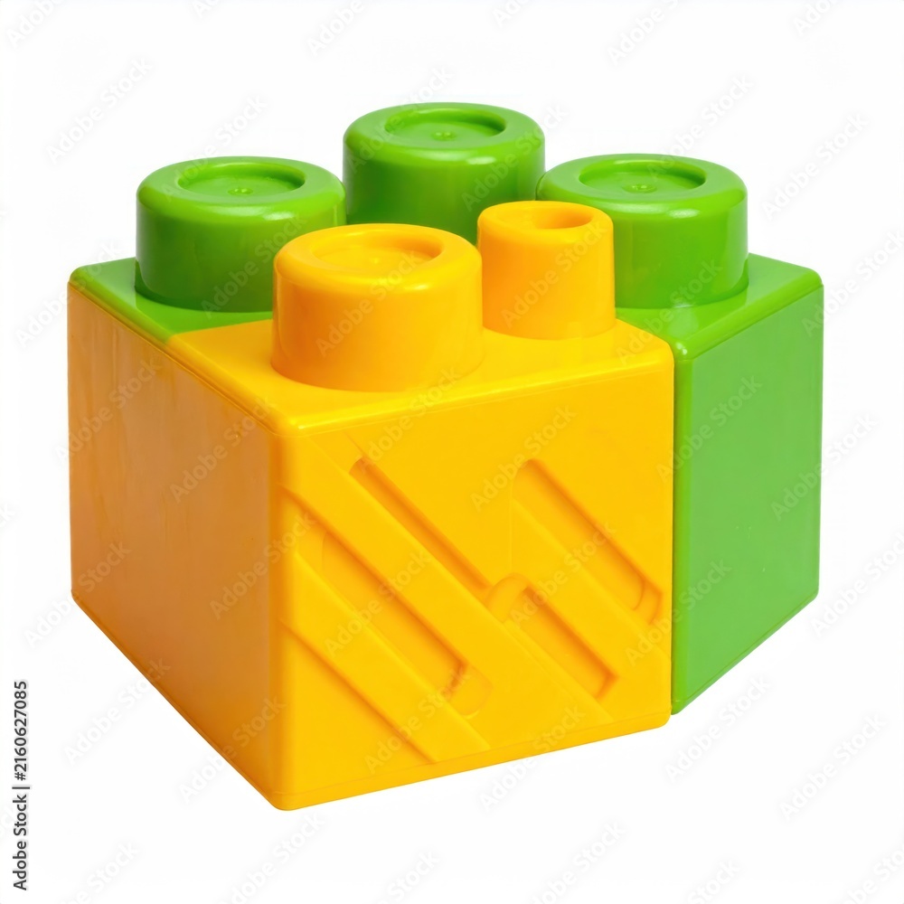Fototapeta premium Close-up of a colorful building block with protruding pegs. Bright, solid colors. Isolated