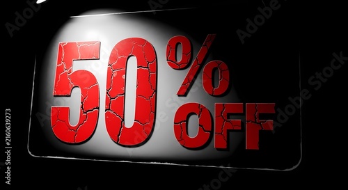 Fifty percent off discount text with cracked red texture on dark background in a sharp focus studio shot for retail sales promotion