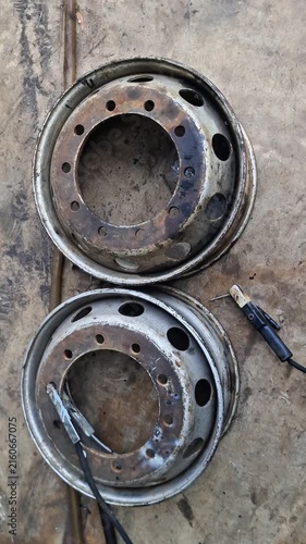 Pair of Used 10-Lug Heavy Duty Truck Steel Wheel Rims Prepared for Welding Repair in Workshop