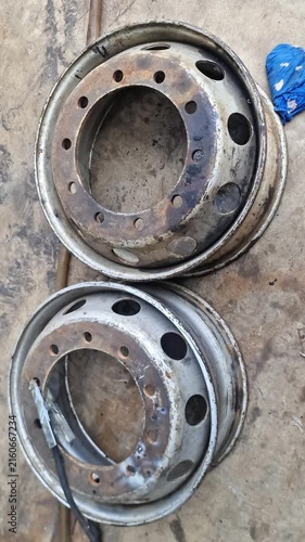 Pair of Used 10-Lug Heavy Duty Truck Steel Wheel Rims Prepared for Welding Repair in Workshop