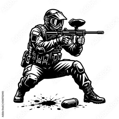 Paintball player in action with mask and gun outdoors