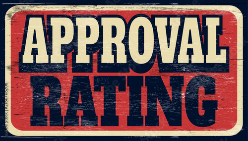 Aged retro approval rating sign on wood