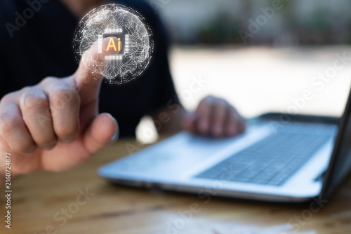 Close-up of businessman using laptop with floating AI command prompt and icons, representing artificial intelligence, prompt engineering, generative technology for digital transformation.
