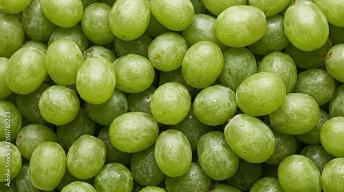 Vibrant green grapes clustered together, showcasing their fresh and healthy appeal, perfect for a natural food concept and wholesome snack