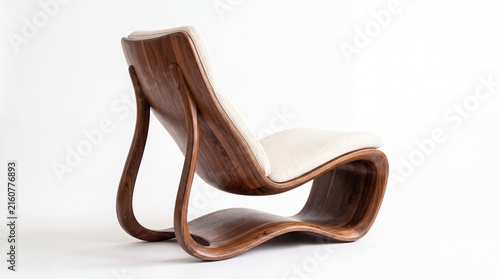 Modern lounge chair featuring organic curved walnut wood frame and upholstered soft beige fabric seat positioned on white background
