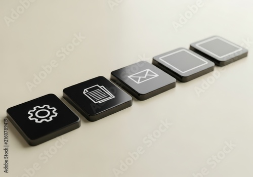 Five black square buttons with white icons arranged in a diagonal line on a light background