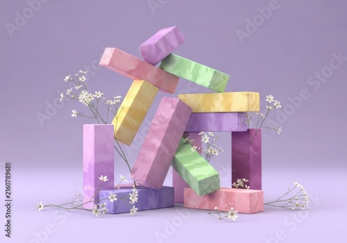 Playful arrangement of colorful pastel geometric blocks stacked precariously with delicate white flowers and soft lighting
