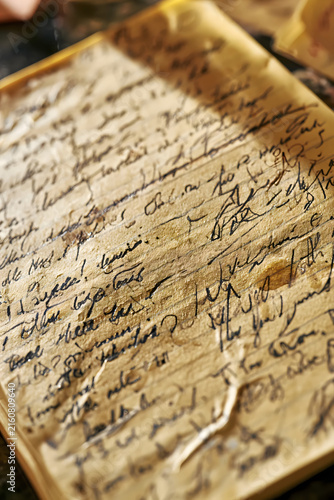 Crumpled Handwritten Note with Coffee Stain