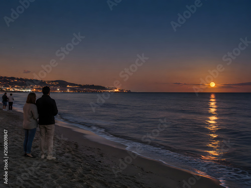 Full Moon over a Peaceful Seaside Night