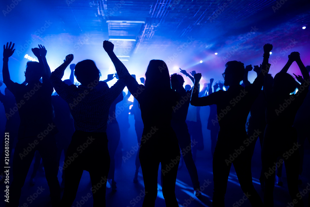 Obraz premium silhouette of disco dancers in night club