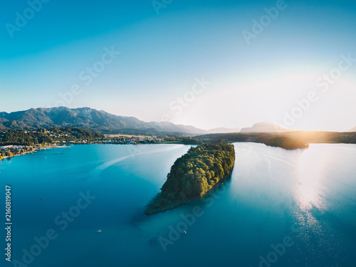 Lake Faak in Carinthia. Scenic aerial view to the island of the famous lake in Austria.