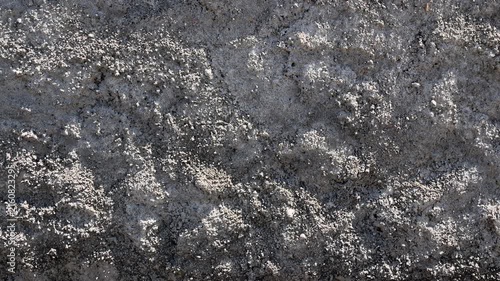 Texture concrete wall of light grey color cement texture background.Grey pastel rough crack cement texture stone concrete,rock plastered stucco wall; painted flat fade background. Side view.  grain