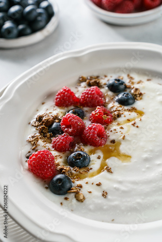 homemade yogurt with raspberries and blueberries
