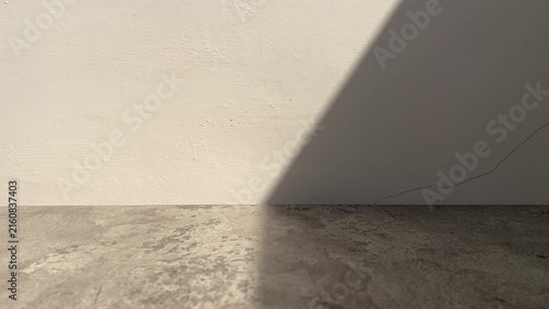 Abstract white wall with grey or gray cement table background for product presentation. Empty room with shadows . 3d room with copy space. Summer concert. backdrop. white wall. side view, front, close