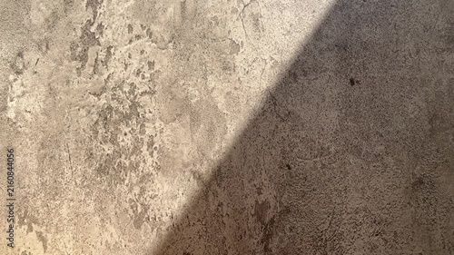 Top view of grey or gray cement floor with sun light and shadows. background. copy space, empty space, free, negative, text, design. Backgrounds. texture. surface. black, dark. sunlight, sunshine.
