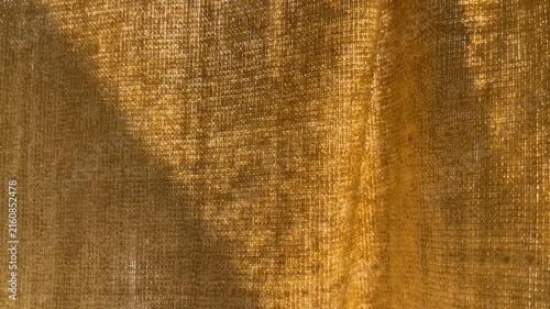 Close up view of yellow shower towel texture. Fluffy carpet background. Blank bathroom textile. Warm sweater natural material. Fabric backdrop detail. yellow flat surface. Home canvas design. space