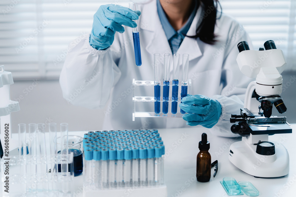 Fototapeta premium Scientists research biochemical solutions in a lab for health care advancements