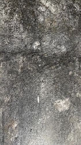 Texture concrete wall of light grey color cement texture background.Grey pastel rough crack cement texture stone concrete,rock plastered stucco wall; painted flat fade background. close up, side view,