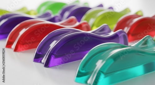 Vibrant Row of Translucent Dolphin Figurines in Assorted Colors.