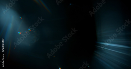 Abstract cinematic lens flare with soft bokeh circles and subtle light reflections. Atmospheric optical effect background ideal for overlays, visual effects, film production and creative design.